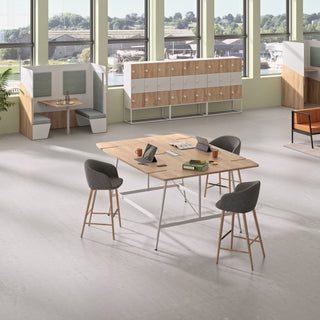 Lifestyle image of Buronomic Locker Eko lockers behind a high meeting table in white and Nebraska