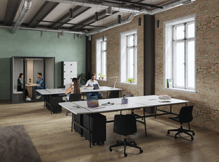 Lifestyle image of Buronomic Paisible pedestals by workstations in a loft with brick walls